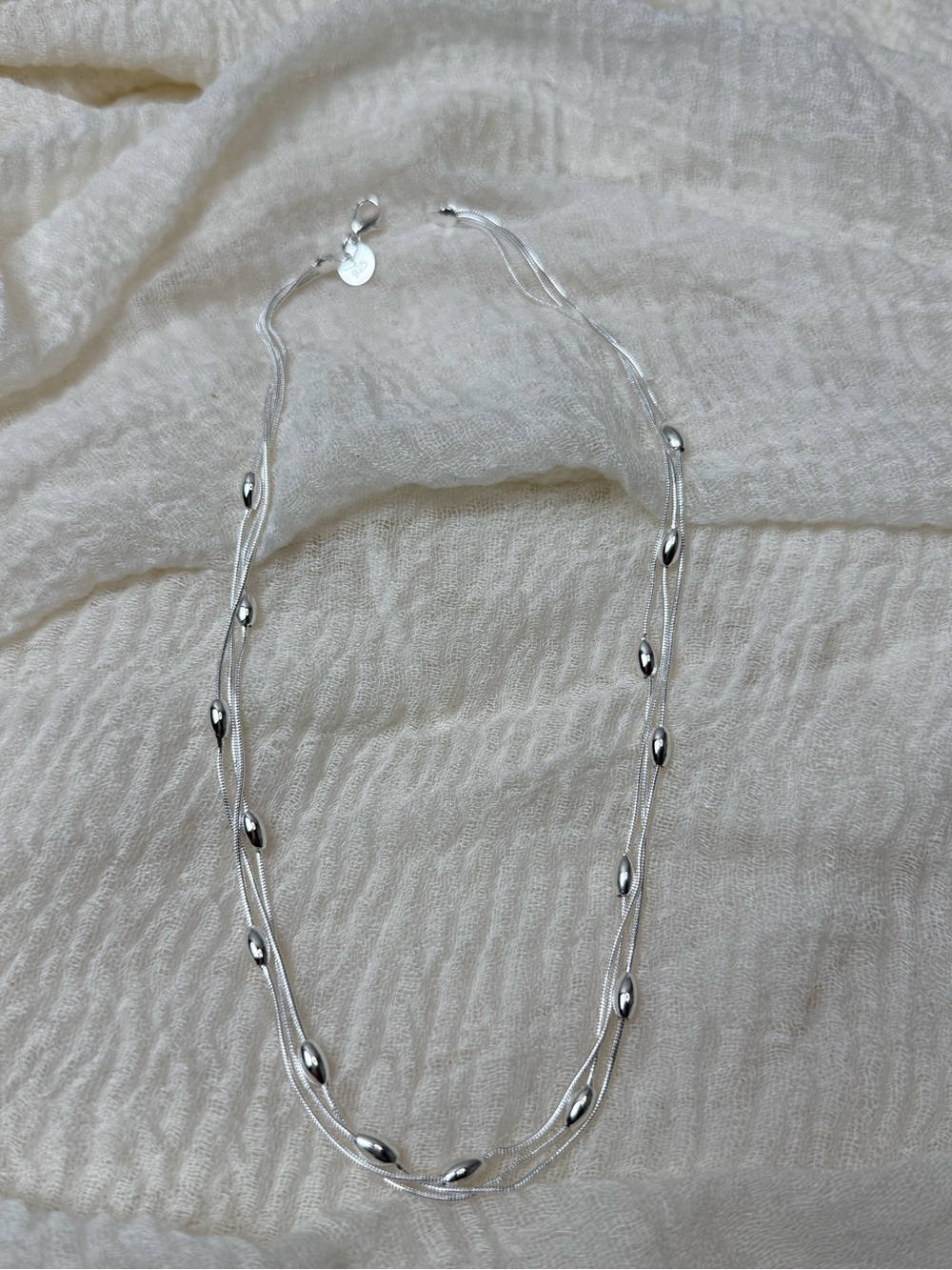 Elegant Silver Multi-Strand Bead Necklace